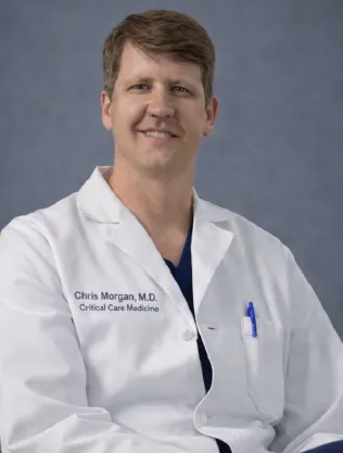 Professional portrait of Christopher Morgan, MD, featured Conzultos expert